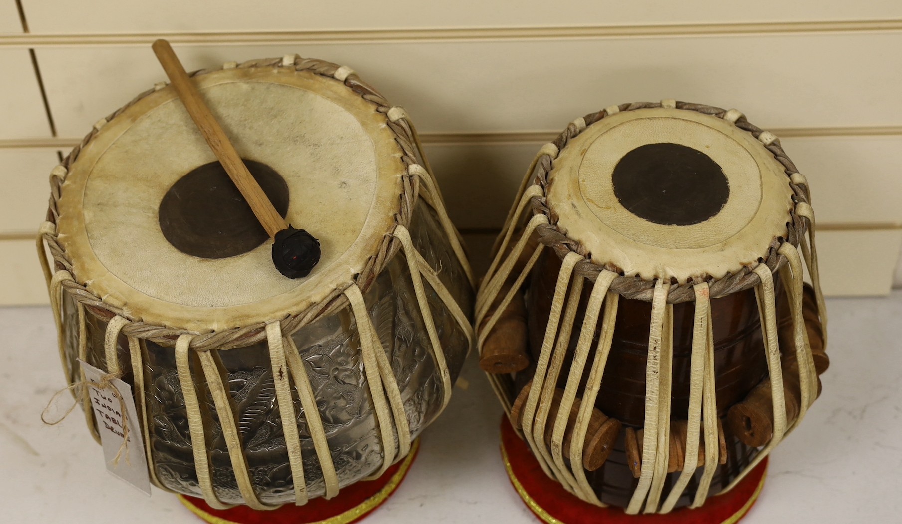 Two Indian Tabla Drums, largest 25 cms diameter.